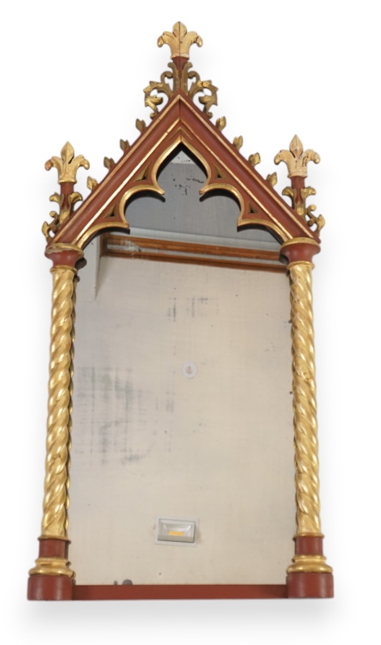 A Victorian Gothic revival painted and giltwood wall mirror